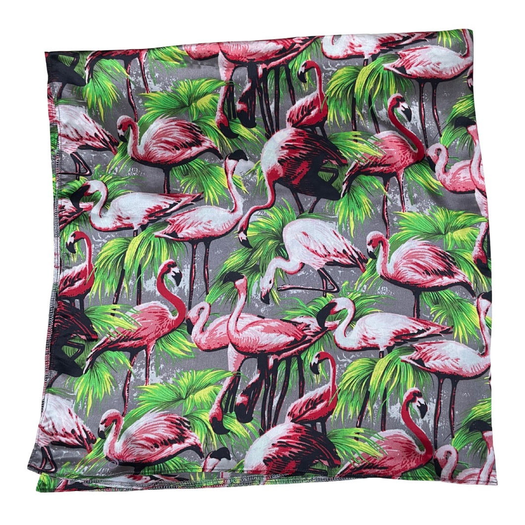 Fabric with pink flamingo pattern on a white background